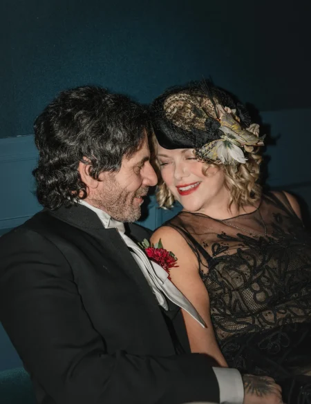 Couple sharing an intimate moment in elegant wedding attire, showcasing love and connection in a sophisticated setting at Belvedere Lenox.